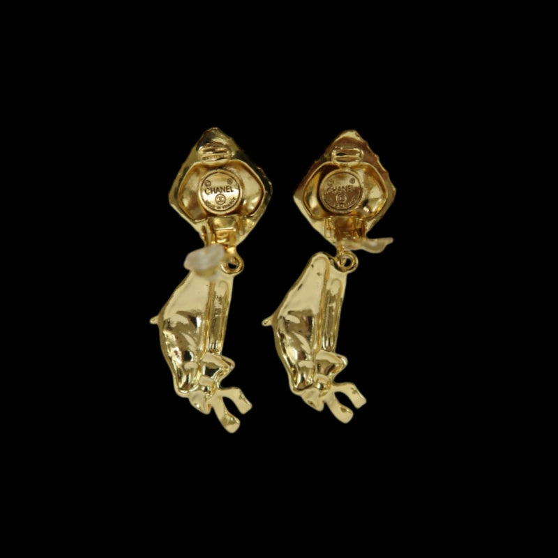 CHANEL gold tone hat shaped clip-on earrings