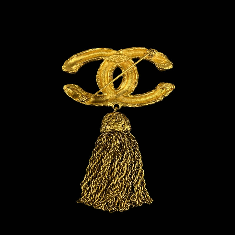 CHANEL brooch, gold-tone alloy hardware, tassel detail, logo design
