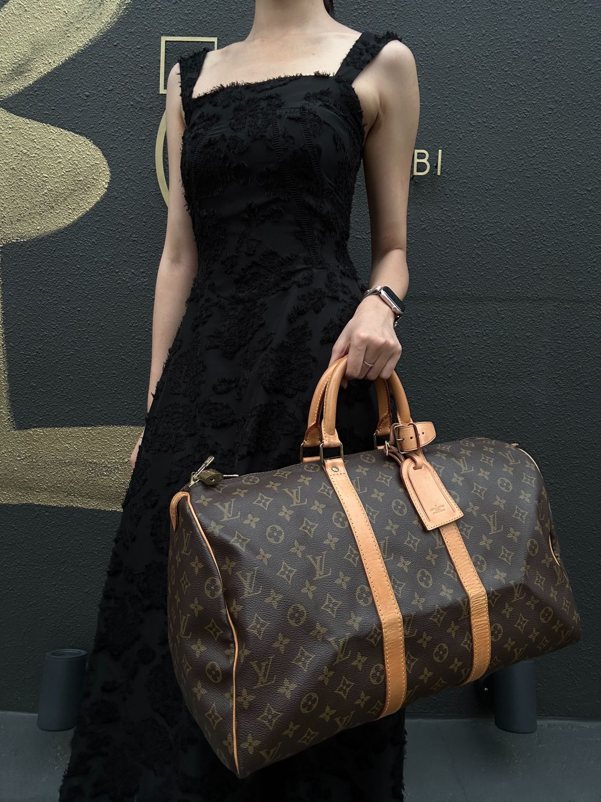 LOUIS VUITTON Monogram Canvas Leather Keepall 45 Travel Bag In Brown With Gold Hardware Including Padlock (No Key), Name Tag And Dust Bag