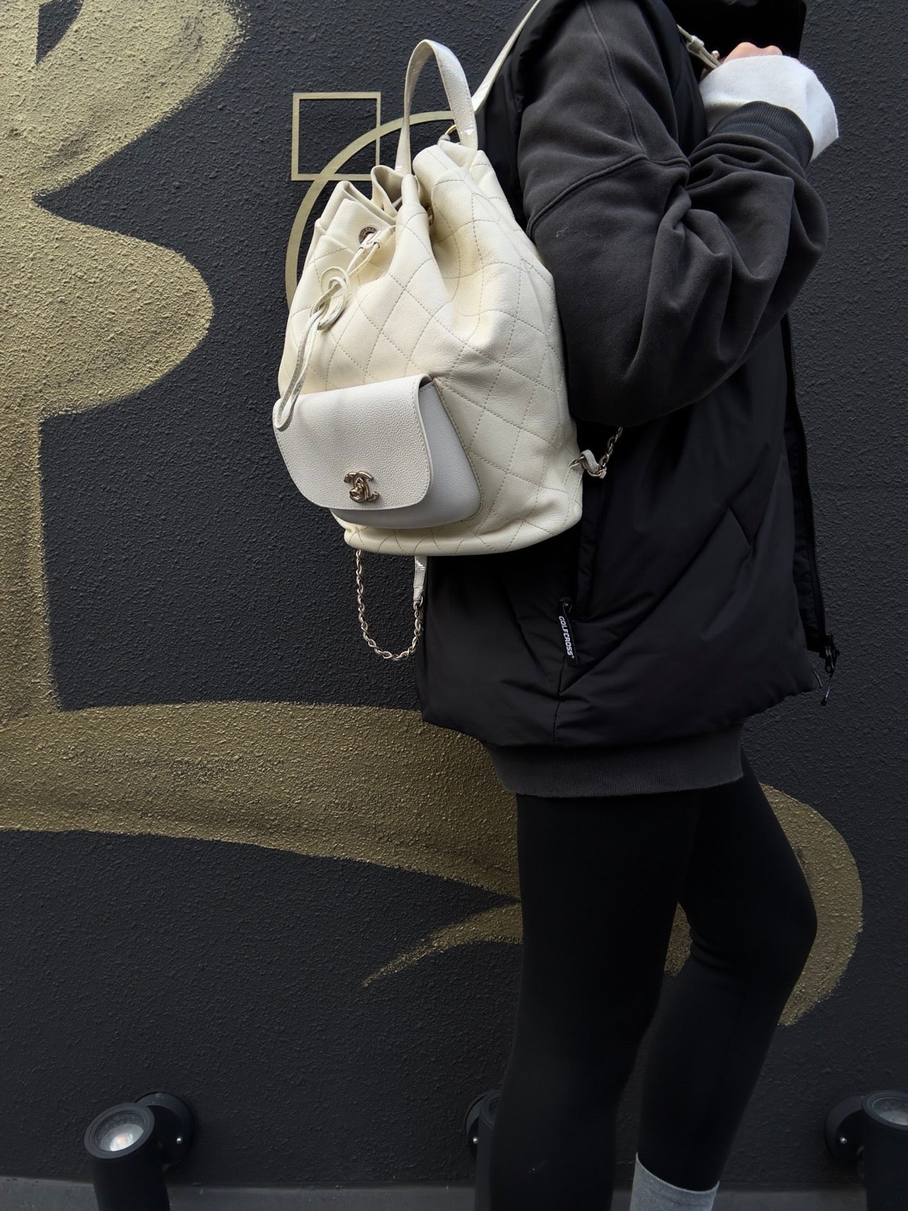 CHANEL Quilted Drawstring Backpack, Off-white Caviar Leather