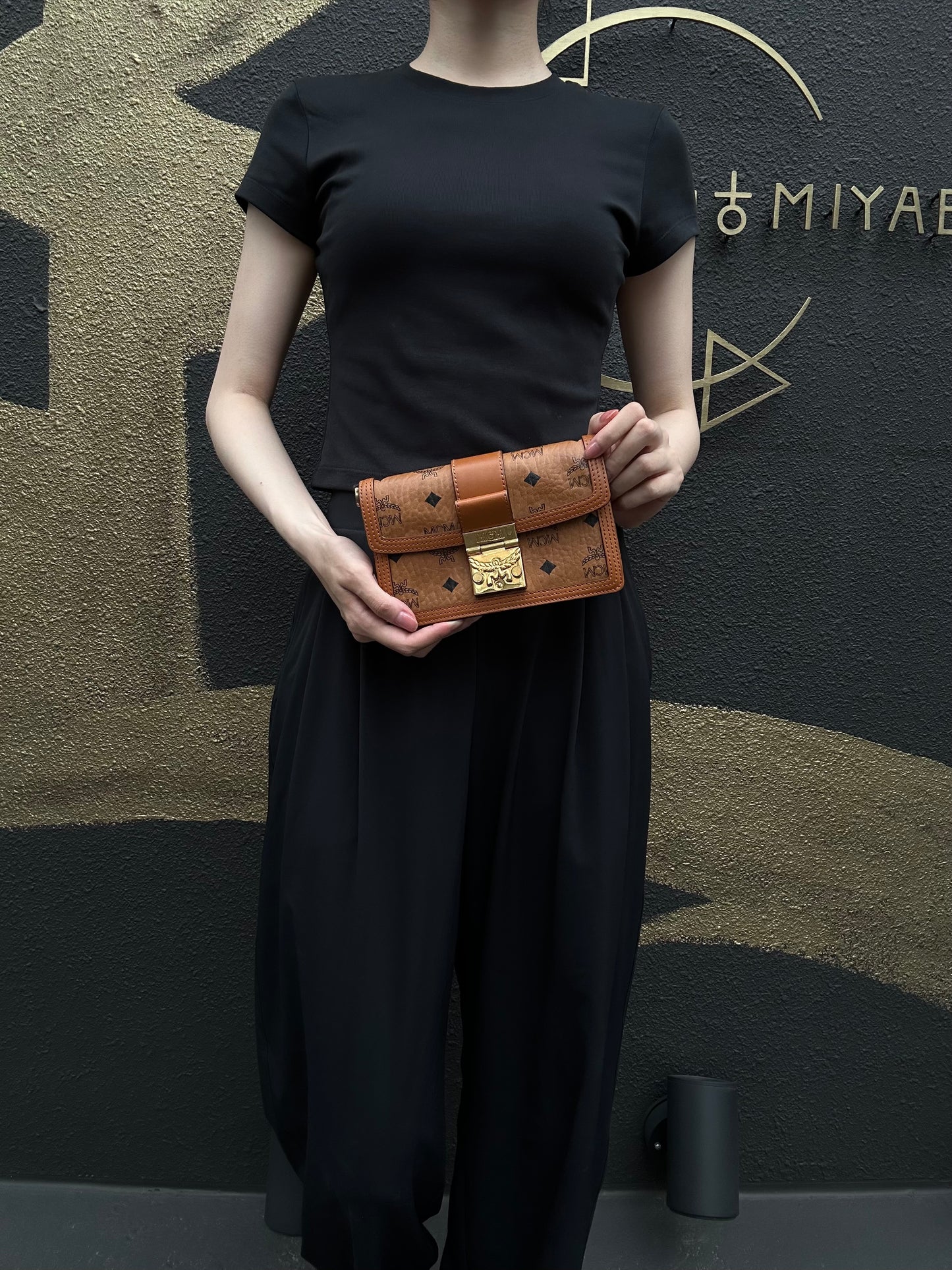 MCM Mini Postman Shoulder Bag Brown Visetos PVC Gold Hardware