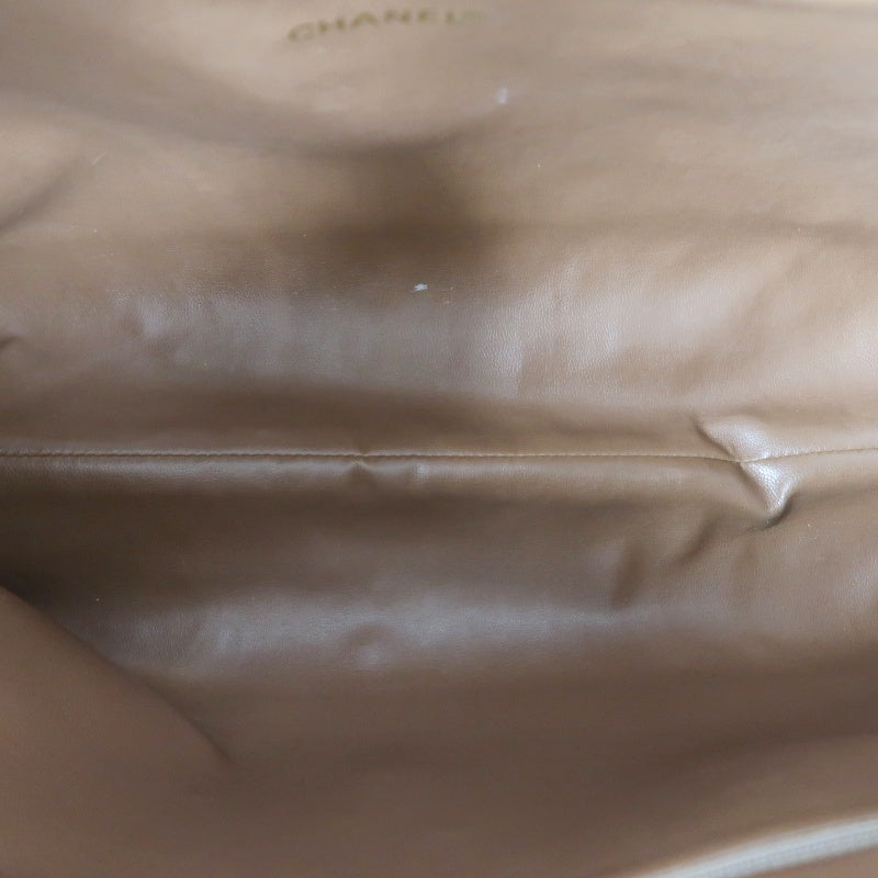 CHANEL Chevron V‑stitch handbag Boston bag calfskin brown