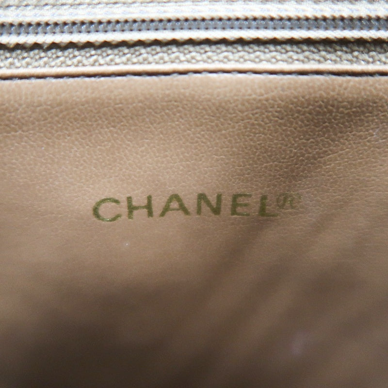 CHANEL Chevron V‑stitch handbag Boston bag calfskin brown