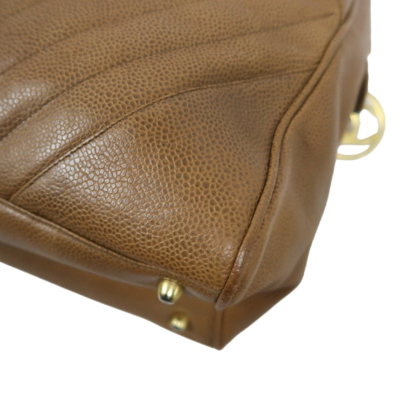 CHANEL Chevron V‑stitch handbag Boston bag calfskin brown