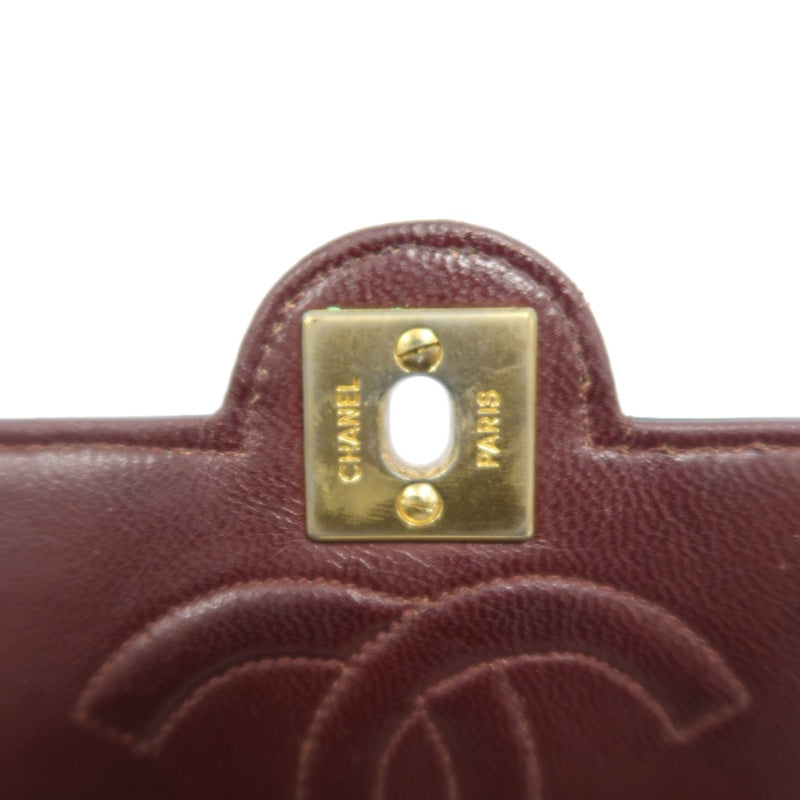 CHANEL Matelasse Shoulder Bag, Black Lambskin, Gold-Tone Hardware, Quilted Flap, Crossbody Style