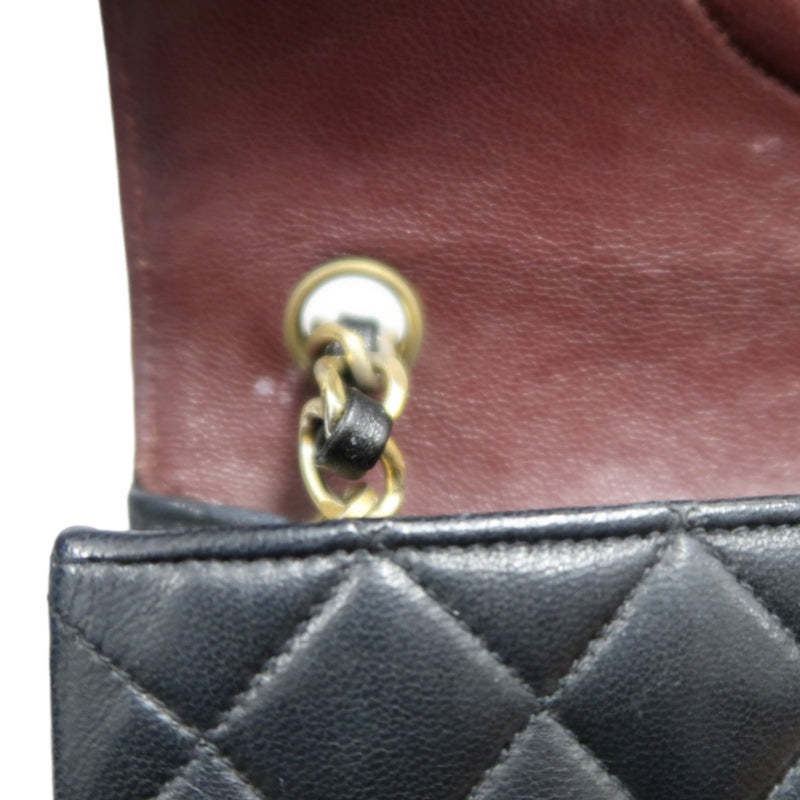 CHANEL Matelasse Shoulder Bag, Black Lambskin, Gold-Tone Hardware, Quilted Flap, Crossbody Style