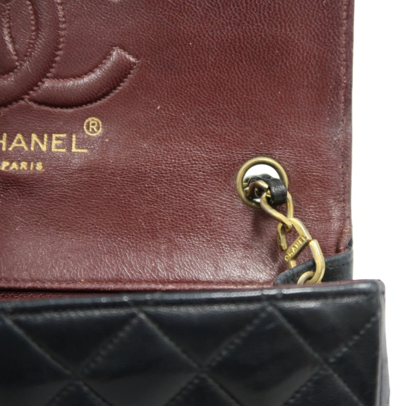 CHANEL Matelasse Shoulder Bag, Black Lambskin, Gold-Tone Hardware, Quilted Flap, Crossbody Style