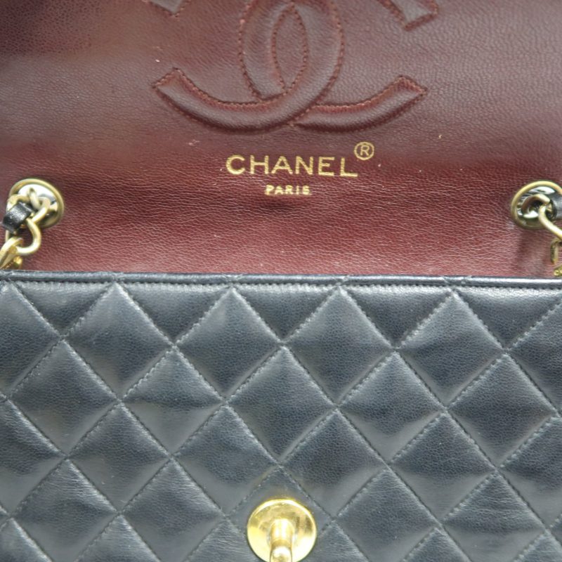 CHANEL Matelasse Shoulder Bag, Black Lambskin, Gold-Tone Hardware, Quilted Flap, Crossbody Style