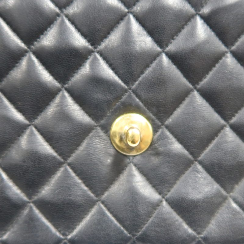 CHANEL Matelasse Shoulder Bag, Black Lambskin, Gold-Tone Hardware, Quilted Flap, Crossbody Style