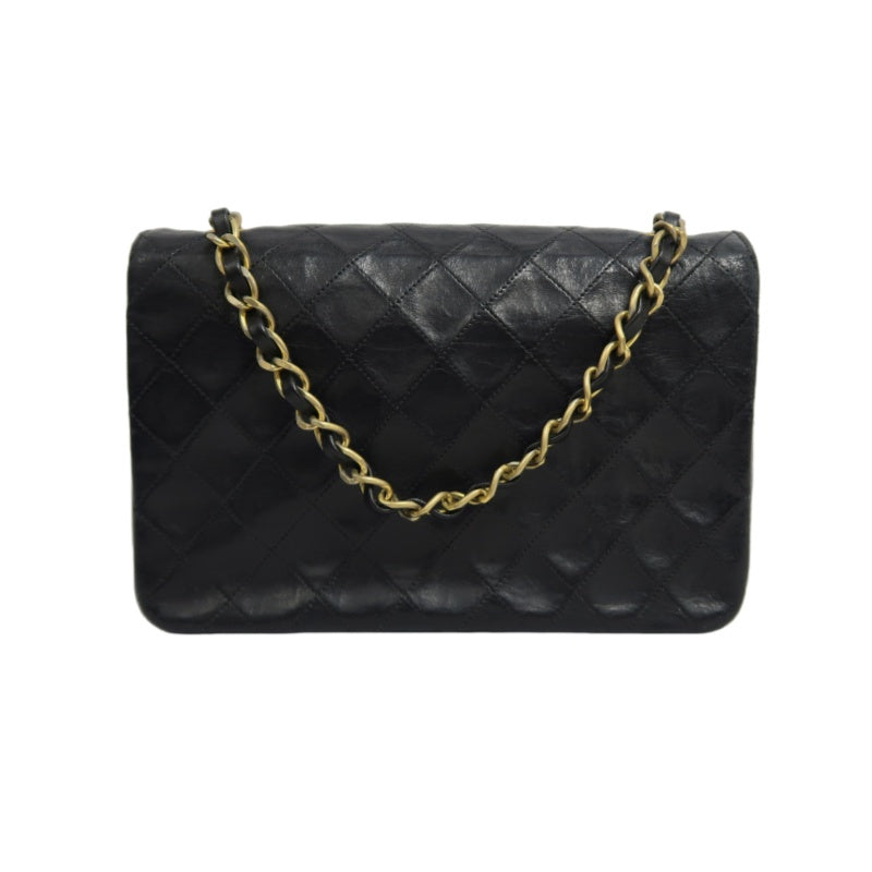 CHANEL Matelasse Shoulder Bag, Black Lambskin, Gold-Tone Hardware, Quilted Flap, Crossbody Style