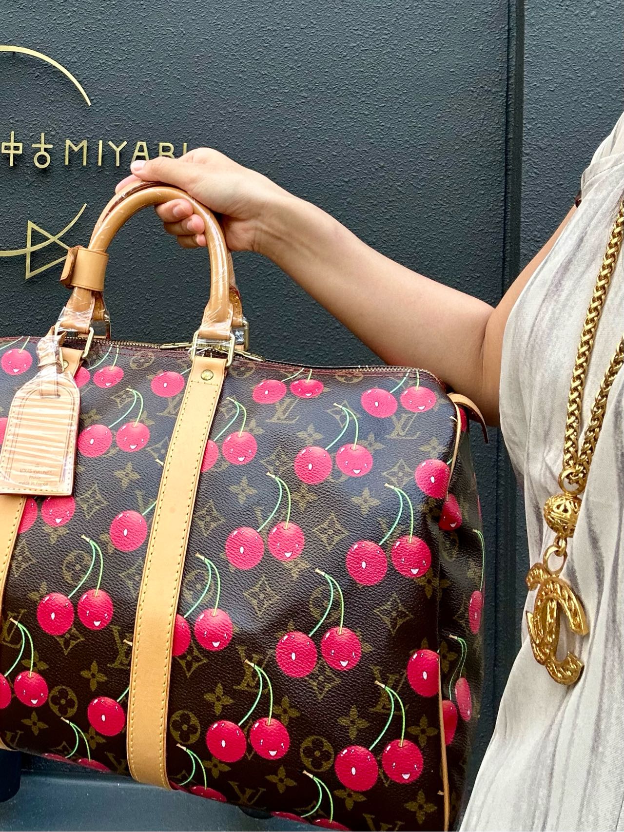 Louis Vuitton (LV) Monogram Cherry Keepall 45, Brown PVC, Limited Edition, Includes Name Tag, Luggage Strap & Boarding Pass Holder