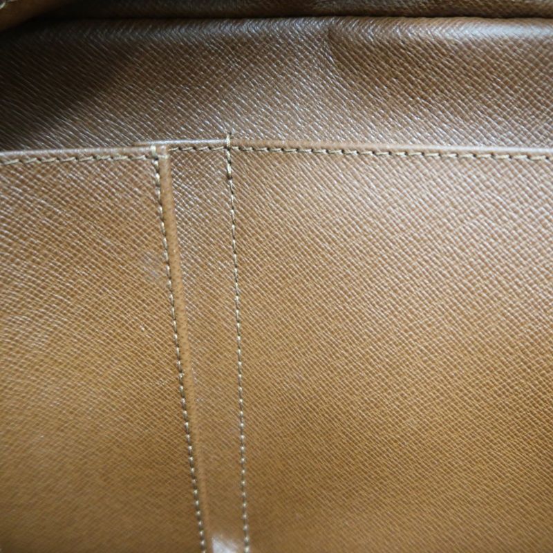 LOUIS VUITTON Cite MM Handbag, Monogram Coated Canvas, Brown