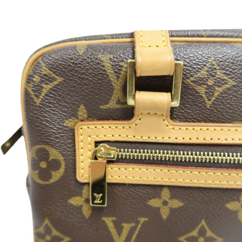 LOUIS VUITTON Cite MM Handbag, Monogram Coated Canvas, Brown