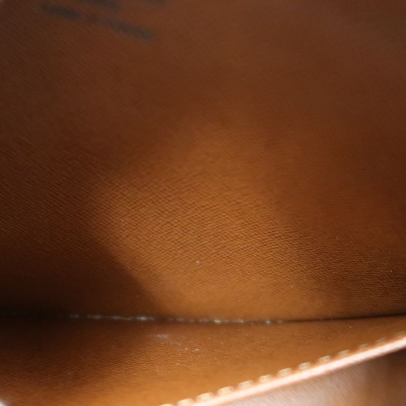 LOUIS VUITTON Cite MM Handbag, Monogram Coated Canvas, Brown