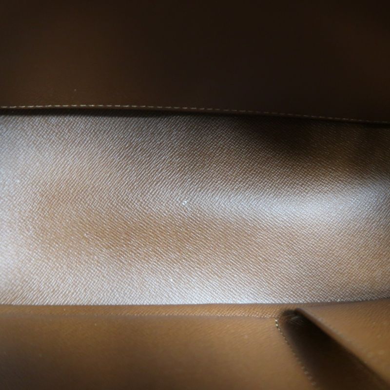 LOUIS VUITTON Cite MM Handbag, Monogram Coated Canvas, Brown