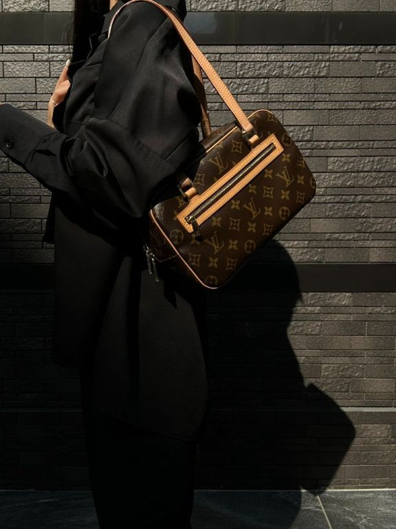 LOUIS VUITTON Cite MM Handbag, Monogram Coated Canvas, Brown