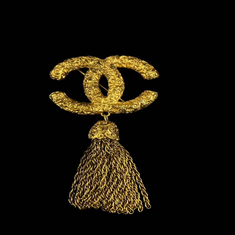 CHANEL brooch, gold-tone alloy hardware, tassel detail, logo design
