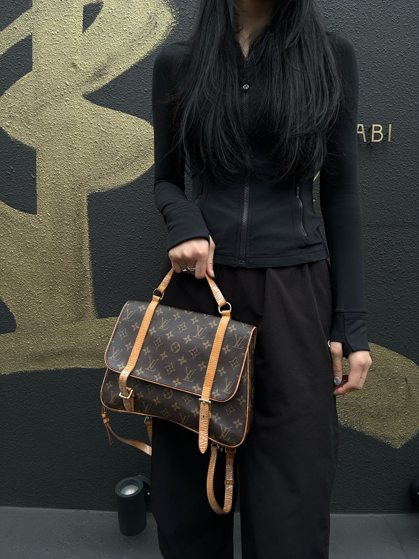 LOUIS VUITTON Marelle Sac a Dos Monogram Handbag, Brown. LV Monogram PVC Backpack.