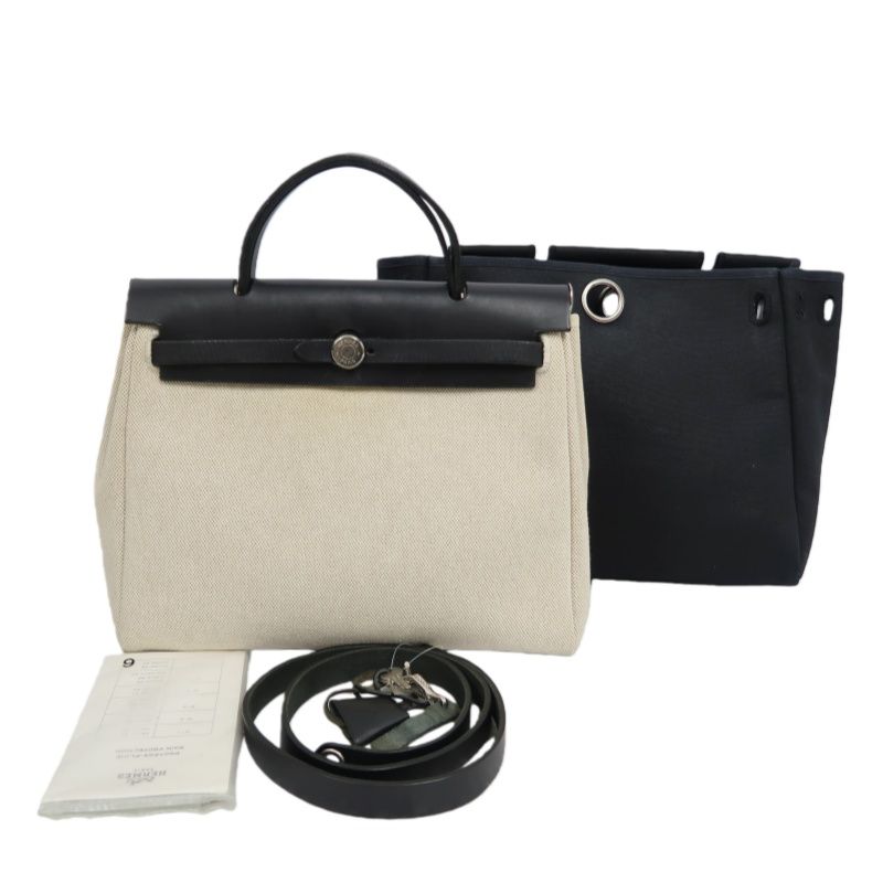 HERMES Herbag PM, Canvas Exterior, Hand, Shoulder & Crossbody Bag, Beige/Black, with 2 Keys, Shoulder Strap, Clochette, 2 Rain Covers, Stopper and Extra Inner Bag