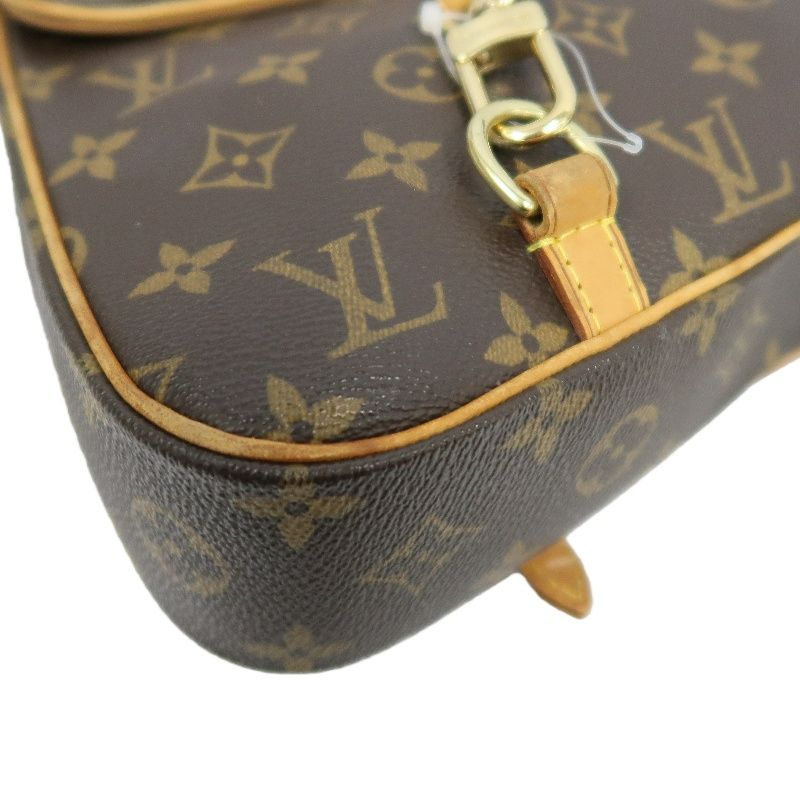 LOUIS VUITTON Marelle Sac a Dos Monogram Handbag, Brown. LV Monogram PVC Backpack.