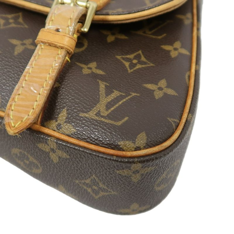 LOUIS VUITTON Marelle Sac a Dos Monogram Handbag, Brown. LV Monogram PVC Backpack.