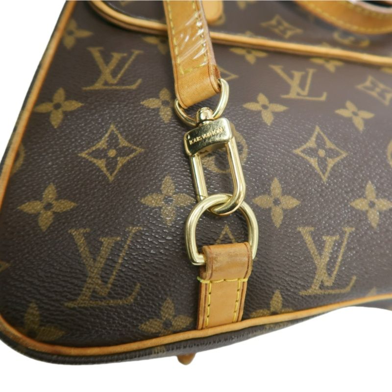 LOUIS VUITTON Marelle Sac a Dos Monogram Handbag, Brown. LV Monogram PVC Backpack.
