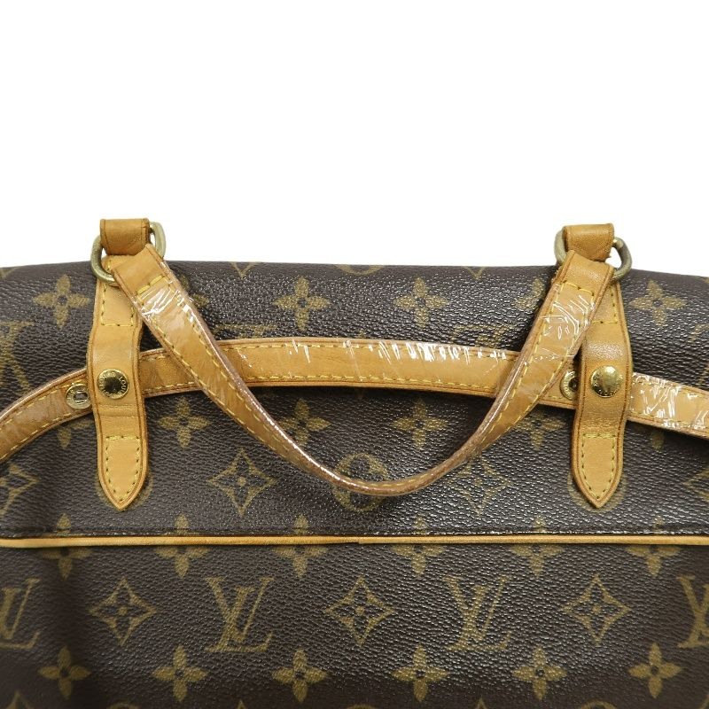 LOUIS VUITTON Marelle Sac a Dos Monogram Handbag, Brown. LV Monogram PVC Backpack.