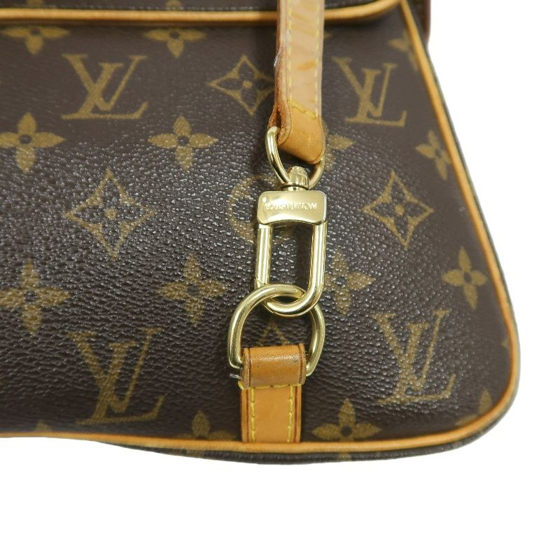 LOUIS VUITTON Marelle Sac a Dos Monogram Handbag, Brown. LV Monogram PVC Backpack.