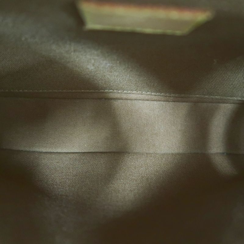 LOUIS VUITTON Marelle Sac a Dos Monogram Handbag, Brown. LV Monogram PVC Backpack.