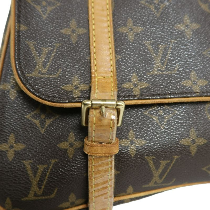 LOUIS VUITTON Marelle Sac a Dos Monogram Handbag, Brown. LV Monogram PVC Backpack.