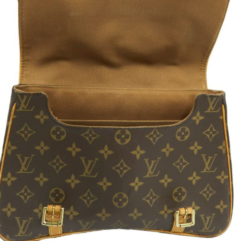 LOUIS VUITTON Marelle Sac a Dos Monogram Handbag, Brown. LV Monogram PVC Backpack.