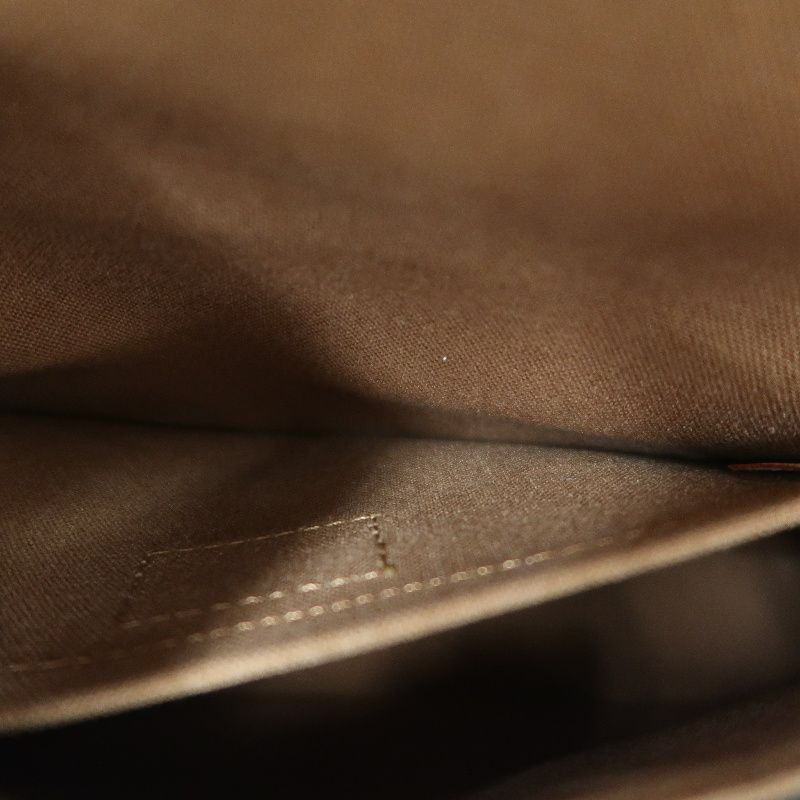LOUIS VUITTON Marelle Sac a Dos Monogram Handbag, Brown. LV Monogram PVC Backpack.