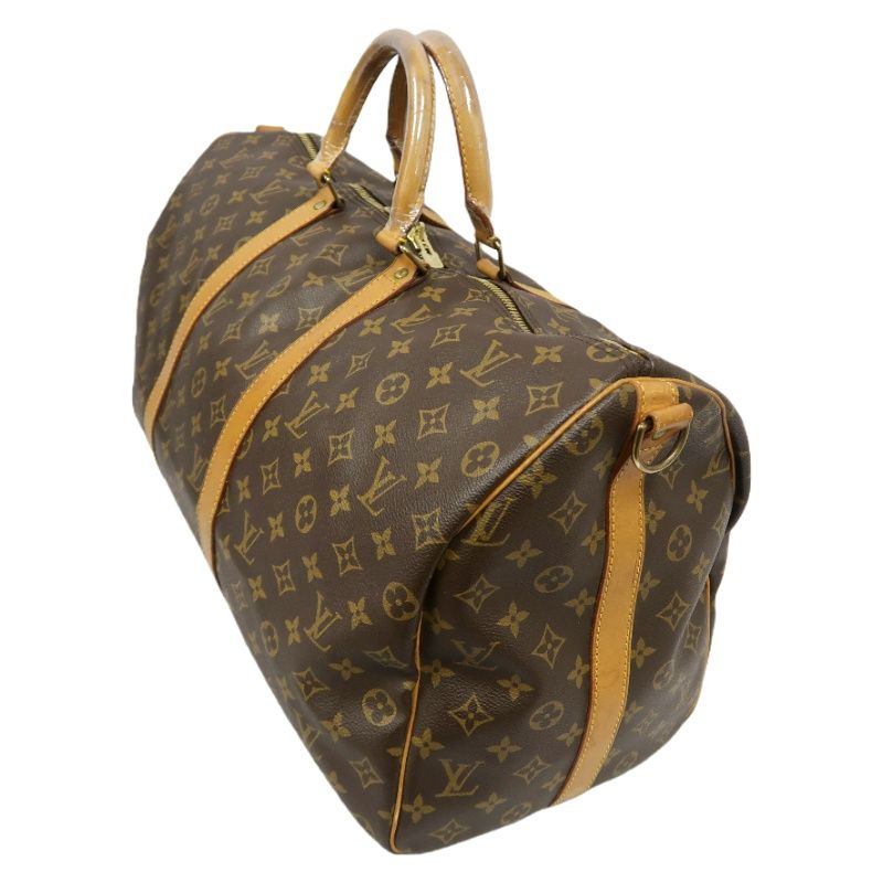 LOUIS VUITTON Keepall Bandouliere 50 Monogram Boston Bag, Brown. Comes with shoulder strap, name tag and handle strap. LV Monogram PVC Keepall travel duffel bag, handbag.