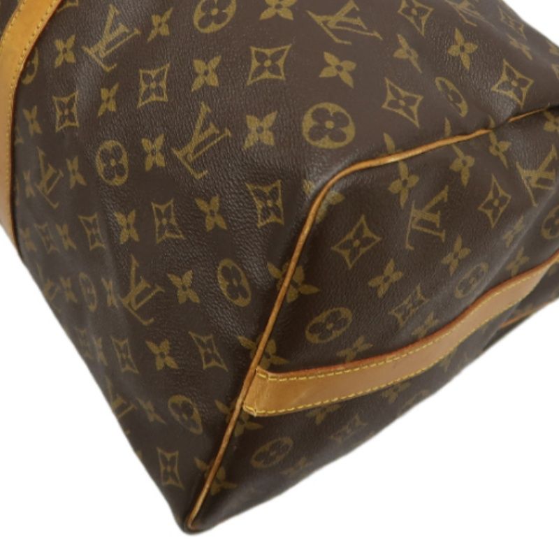 LOUIS VUITTON Keepall Bandouliere 50 Monogram Boston Bag, Brown. Comes with shoulder strap, name tag and handle strap. LV Monogram PVC Keepall travel duffel bag, handbag.