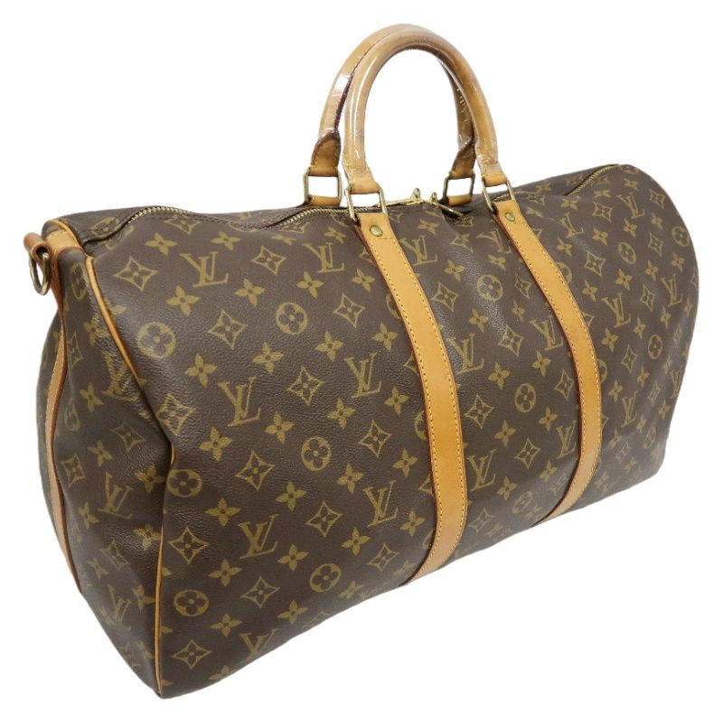 LOUIS VUITTON Keepall Bandouliere 50 Monogram Boston Bag, Brown. Comes with shoulder strap, name tag and handle strap. LV Monogram PVC Keepall travel duffel bag, handbag.