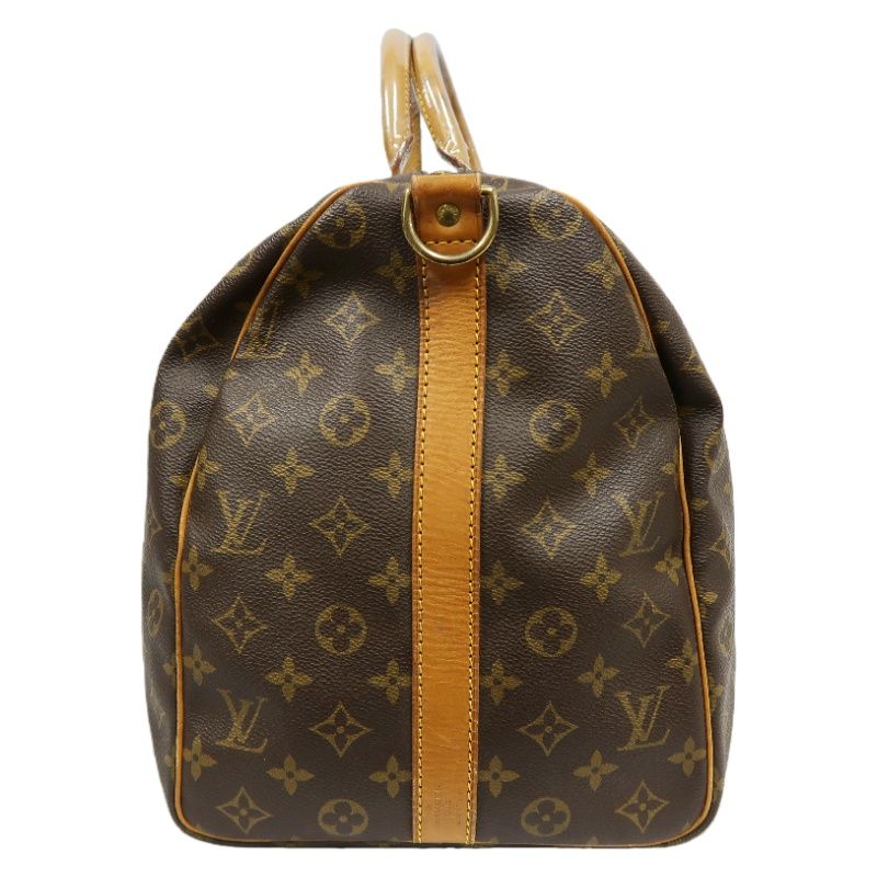 LOUIS VUITTON Keepall Bandouliere 50 Monogram Boston Bag, Brown. Comes with shoulder strap, name tag and handle strap. LV Monogram PVC Keepall travel duffel bag, handbag.