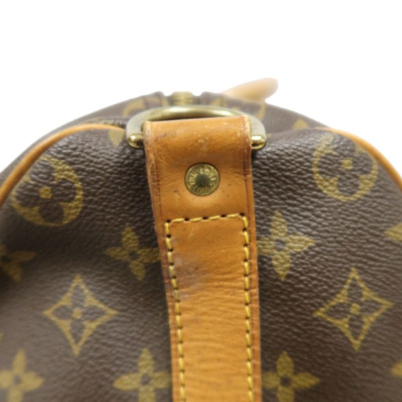 LOUIS VUITTON Keepall Bandouliere 50 Monogram Boston Bag, Brown. Comes with shoulder strap, name tag and handle strap. LV Monogram PVC Keepall travel duffel bag, handbag.