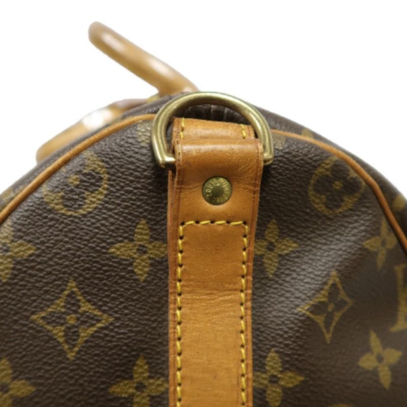 LOUIS VUITTON Keepall Bandouliere 50 Monogram Boston Bag, Brown. Comes with shoulder strap, name tag and handle strap. LV Monogram PVC Keepall travel duffel bag, handbag.