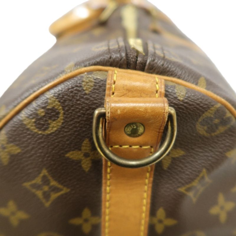 LOUIS VUITTON Keepall Bandouliere 50 Monogram Boston Bag, Brown. Comes with shoulder strap, name tag and handle strap. LV Monogram PVC Keepall travel duffel bag, handbag.