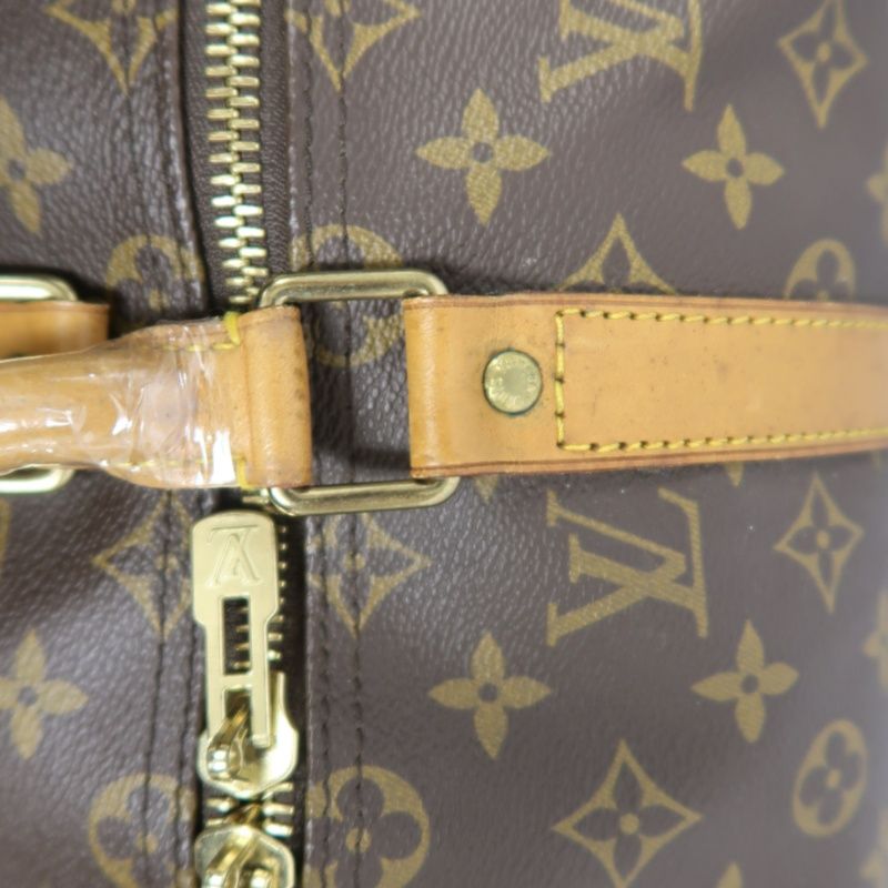LOUIS VUITTON Keepall Bandouliere 50 Monogram Boston Bag, Brown. Comes with shoulder strap, name tag and handle strap. LV Monogram PVC Keepall travel duffel bag, handbag.