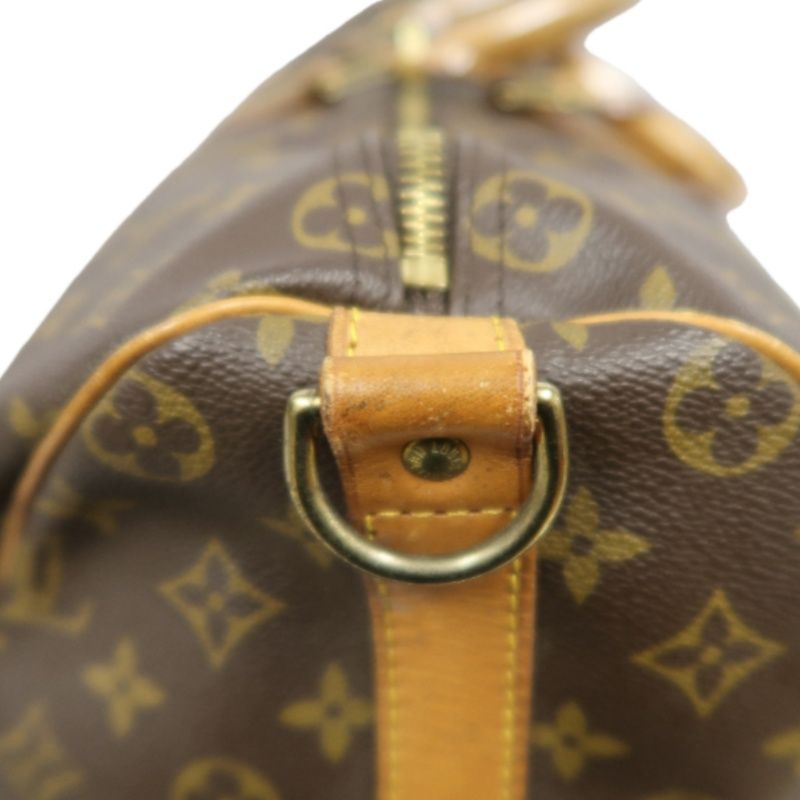 LOUIS VUITTON Keepall Bandouliere 50 Monogram Boston Bag, Brown. Comes with shoulder strap, name tag and handle strap. LV Monogram PVC Keepall travel duffel bag, handbag.