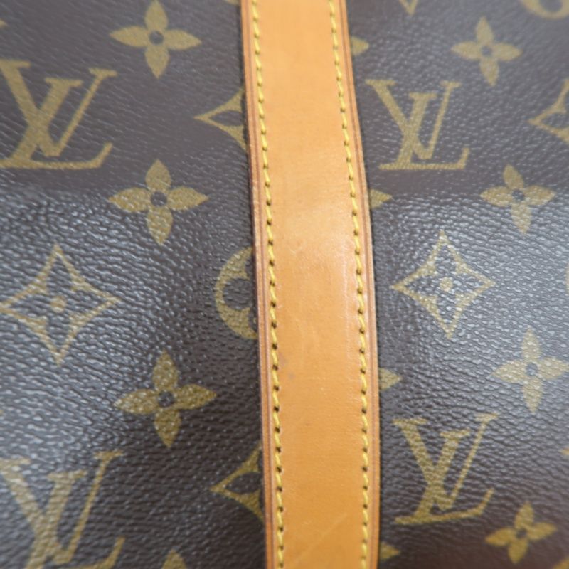 LOUIS VUITTON Keepall Bandouliere 50 Monogram Boston Bag, Brown. Comes with shoulder strap, name tag and handle strap. LV Monogram PVC Keepall travel duffel bag, handbag.