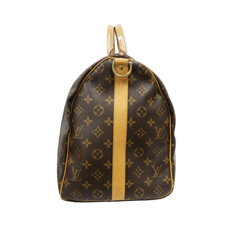 LOUIS VUITTON Keepall Bandouliere 50 Monogram Boston Bag, Brown. Includes padlock, shoulder strap, name tag and poignet. No keys. LV Monogram PVC Keepall 50 travel duffel bag, handbag.