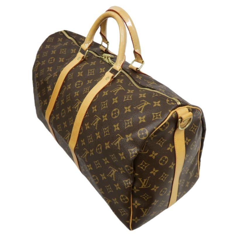 LOUIS VUITTON Keepall Bandouliere 50 Monogram Boston Bag, Brown. Includes padlock, shoulder strap, name tag and poignet. No keys. LV Monogram PVC Keepall 50 travel duffel bag, handbag.
