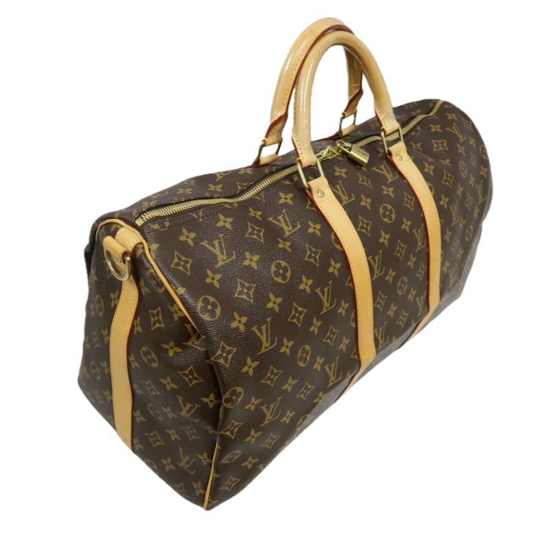 LOUIS VUITTON Keepall Bandouliere 50 Monogram Boston Bag, Brown. Includes padlock, shoulder strap, name tag and poignet. No keys. LV Monogram PVC Keepall 50 travel duffel bag, handbag.