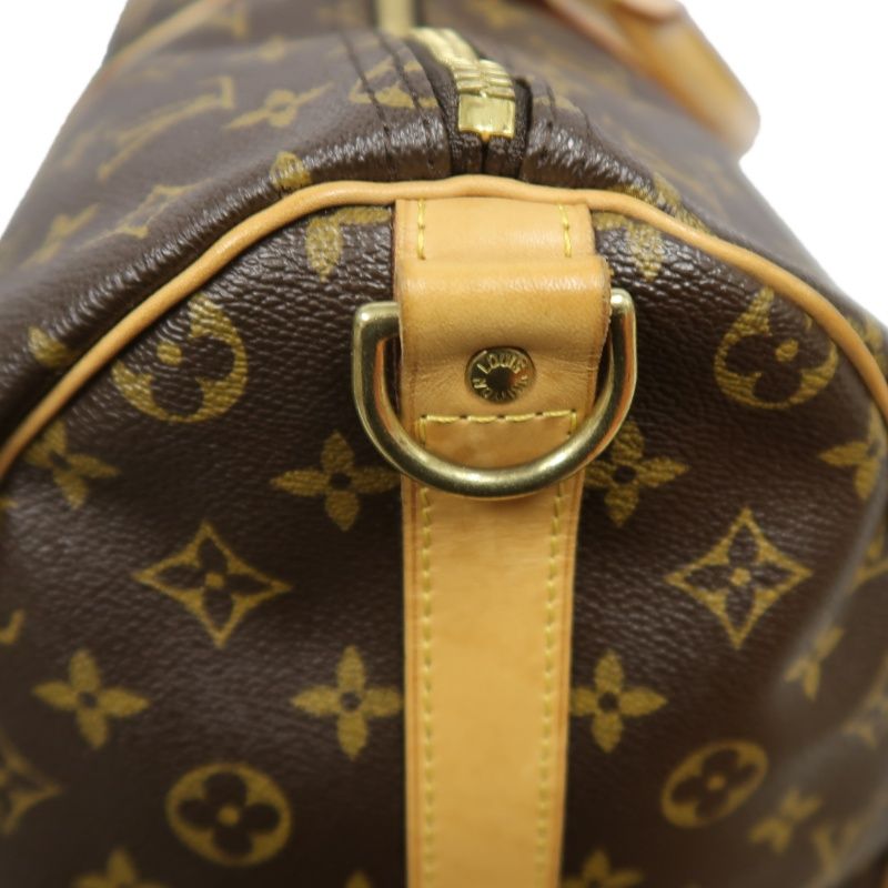 LOUIS VUITTON Keepall Bandouliere 50 Monogram Boston Bag, Brown. Includes padlock, shoulder strap, name tag and poignet. No keys. LV Monogram PVC Keepall 50 travel duffel bag, handbag.