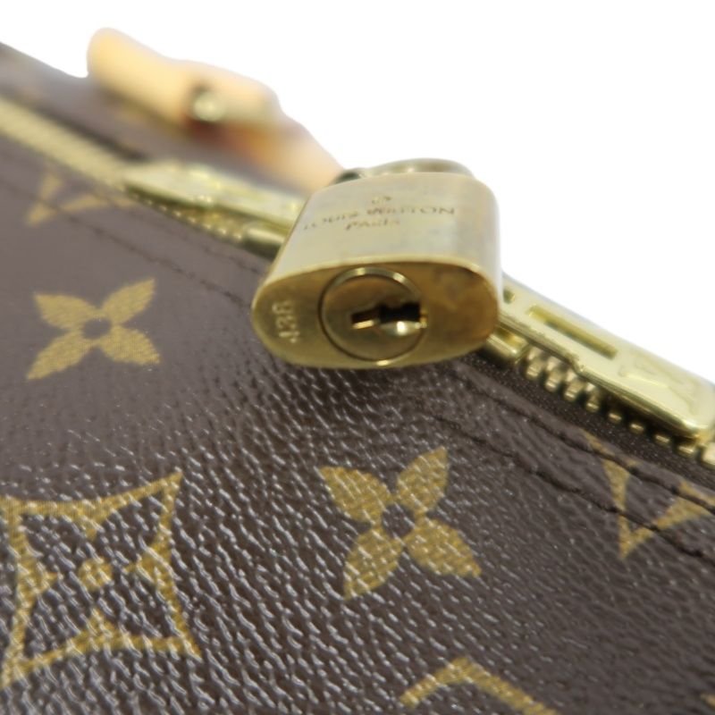LOUIS VUITTON Keepall Bandouliere 50 Monogram Boston Bag, Brown. Includes padlock, shoulder strap, name tag and poignet. No keys. LV Monogram PVC Keepall 50 travel duffel bag, handbag.