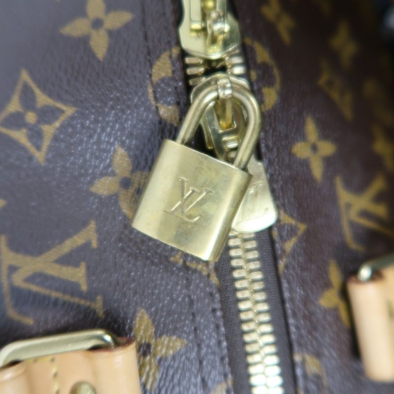 LOUIS VUITTON Keepall Bandouliere 50 Monogram Boston Bag, Brown. Includes padlock, shoulder strap, name tag and poignet. No keys. LV Monogram PVC Keepall 50 travel duffel bag, handbag.