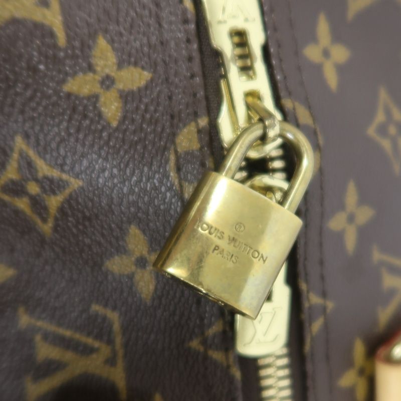 LOUIS VUITTON Keepall Bandouliere 50 Monogram Boston Bag, Brown. Includes padlock, shoulder strap, name tag and poignet. No keys. LV Monogram PVC Keepall 50 travel duffel bag, handbag.
