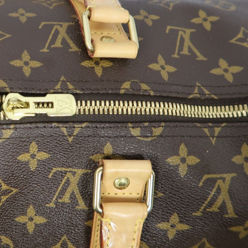 LOUIS VUITTON Keepall Bandouliere 50 Monogram Boston Bag, Brown. Includes padlock, shoulder strap, name tag and poignet. No keys. LV Monogram PVC Keepall 50 travel duffel bag, handbag.